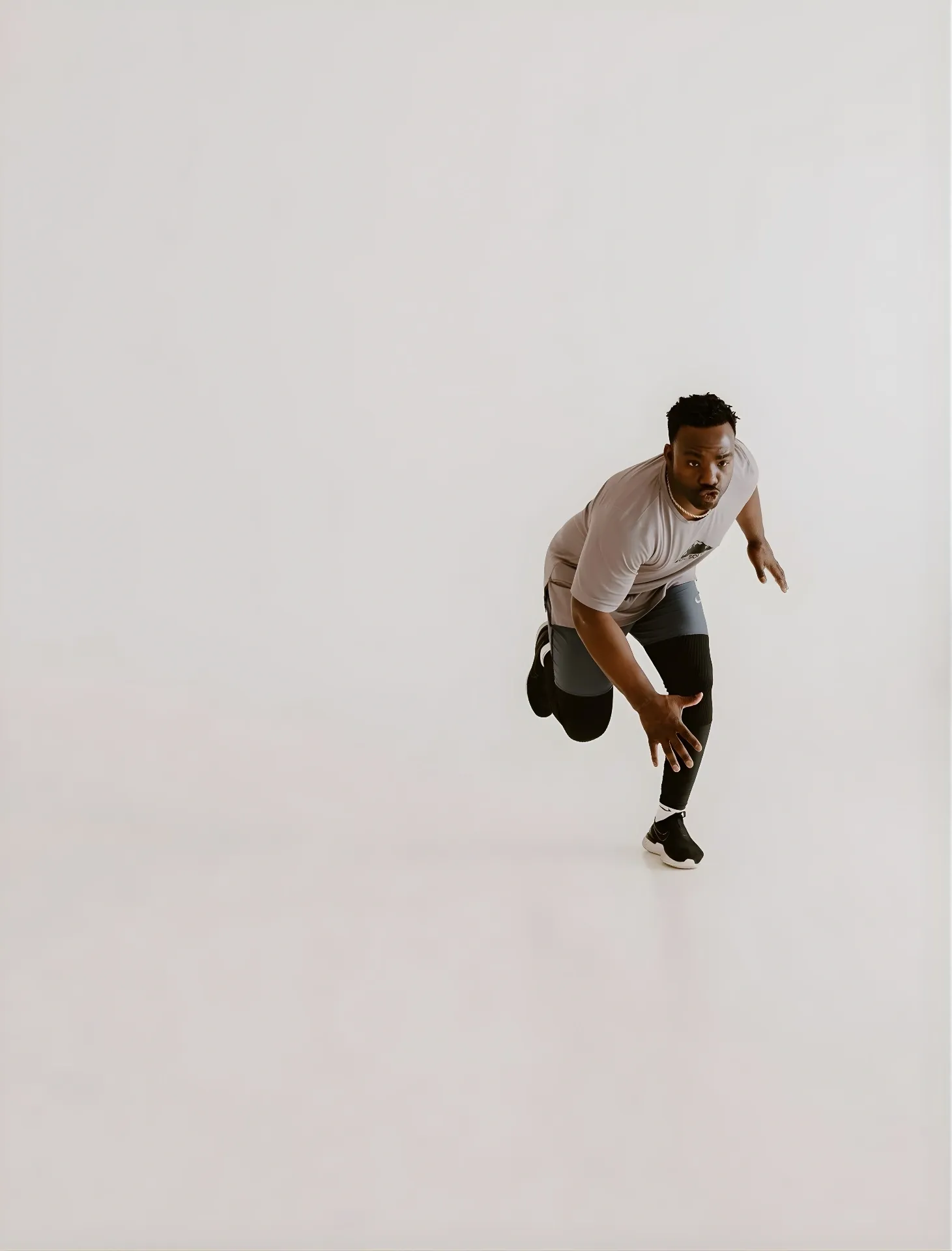 Coach Ben Birmingham sprinting — personal training and athlete development in Edmond, OK